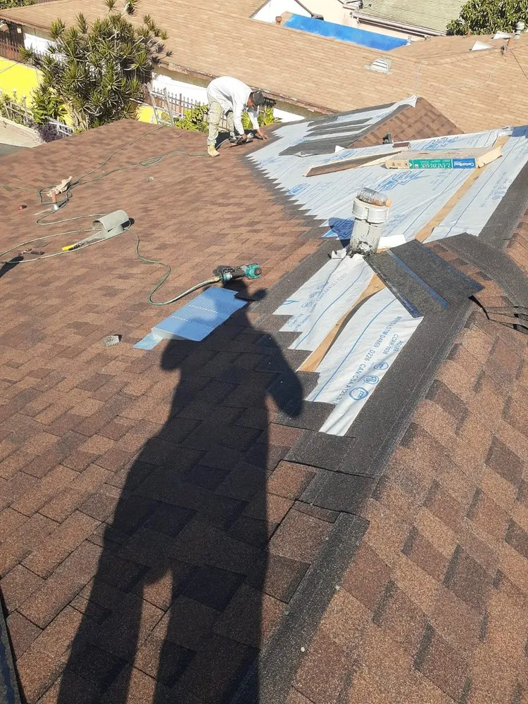 Slide of TopCal Roofing