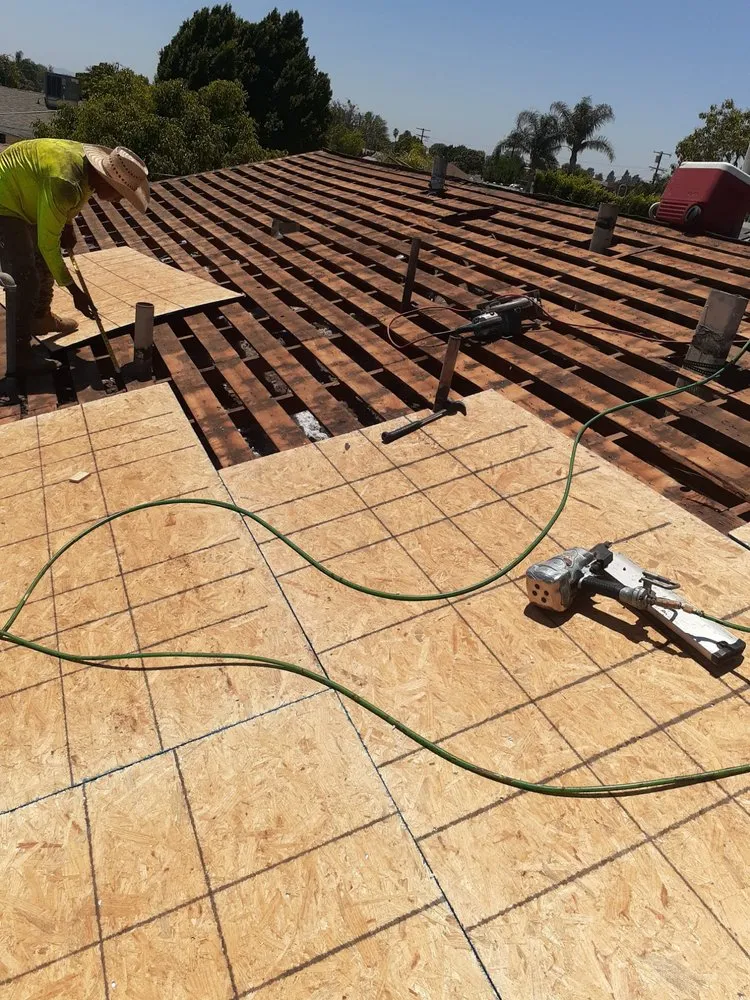 Slide of TopCal Roofing