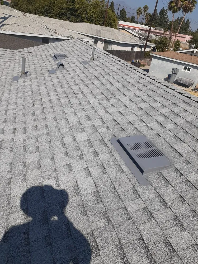 Slide of TopCal Roofing