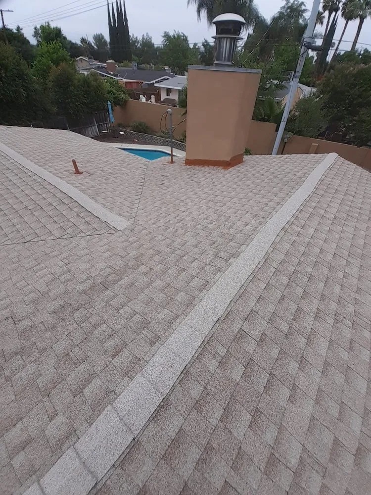 Slide of TopCal Roofing