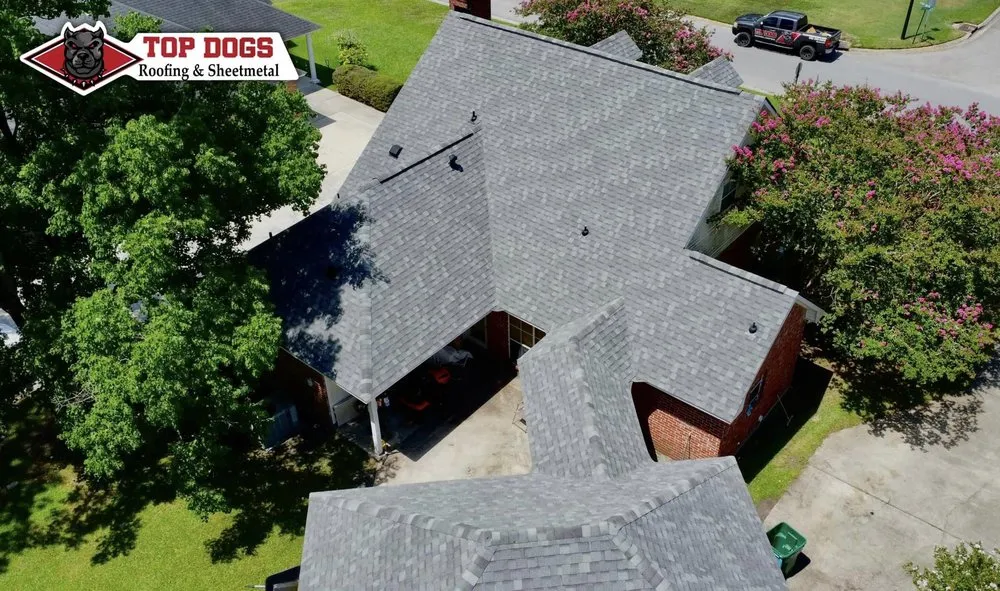 Slide of TopDogs Roofing&Sheetmetal