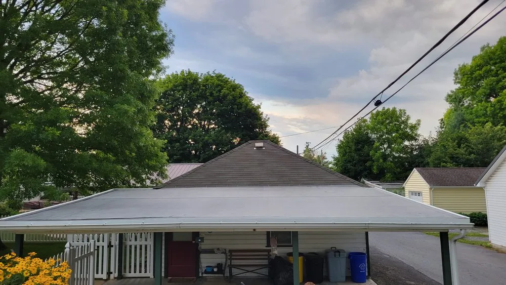 Slide of TopFlight Roofing