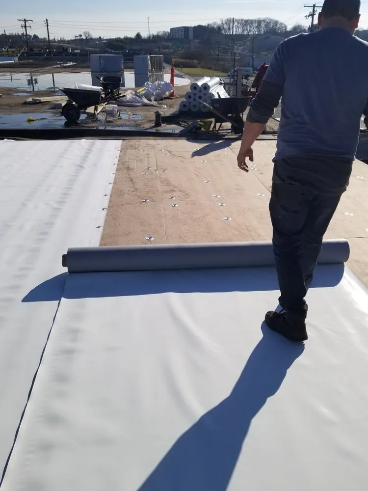 Slide of TopFlight Roofing