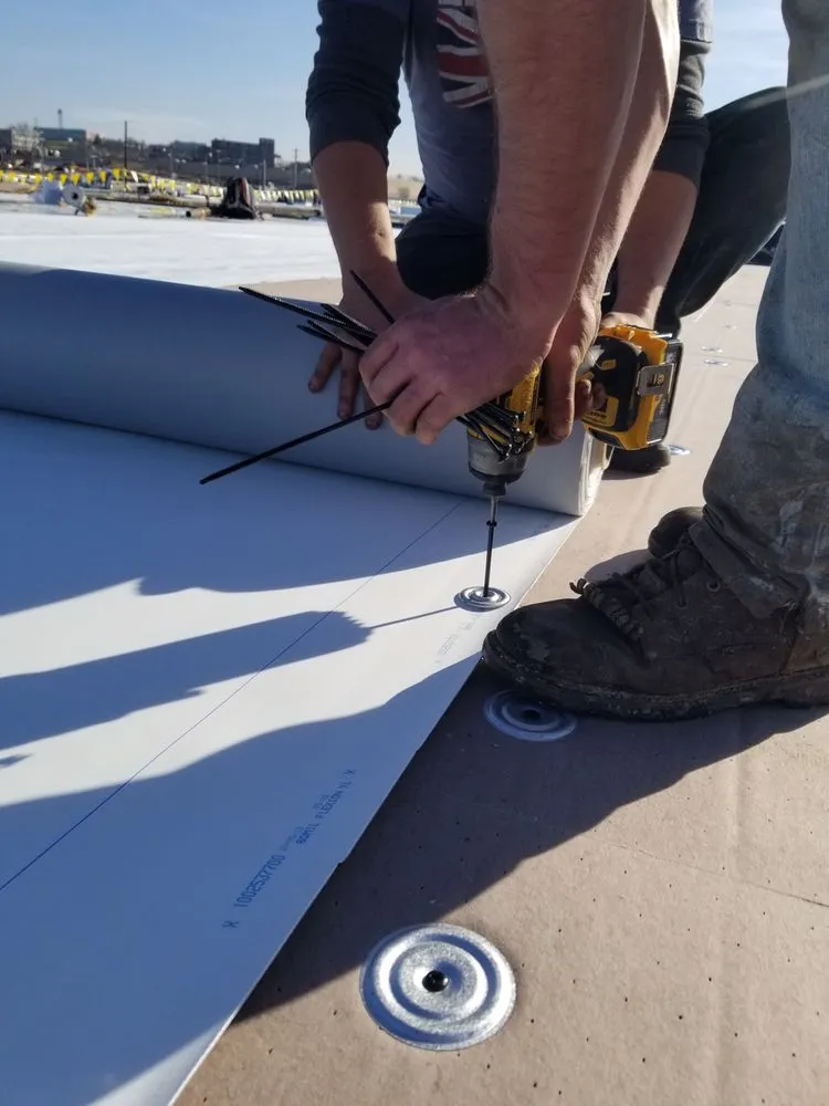 Slide of TopFlight Roofing