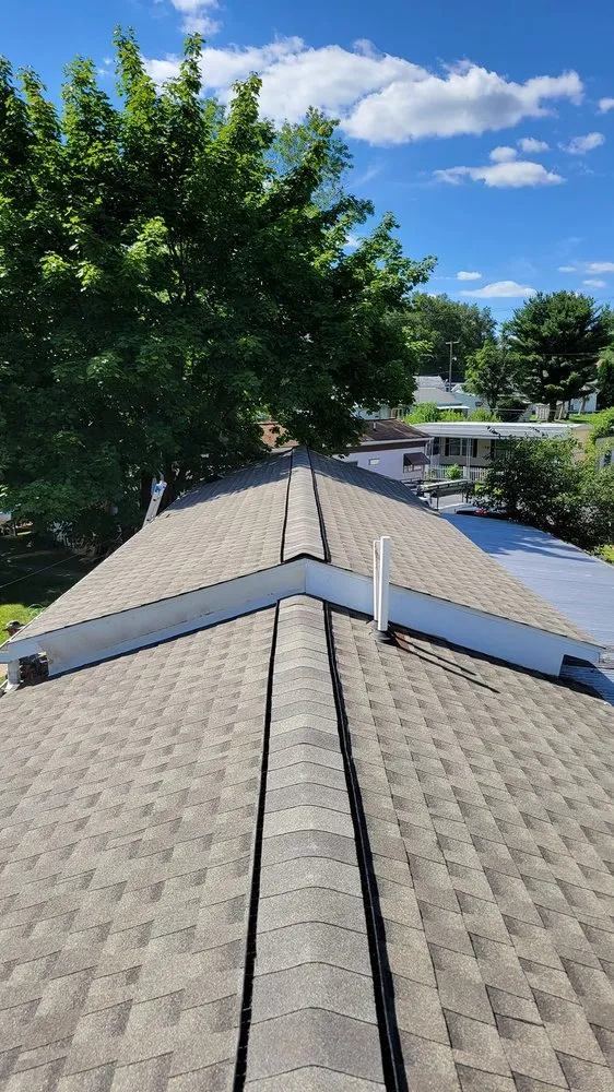 Slide of TopFlight Roofing