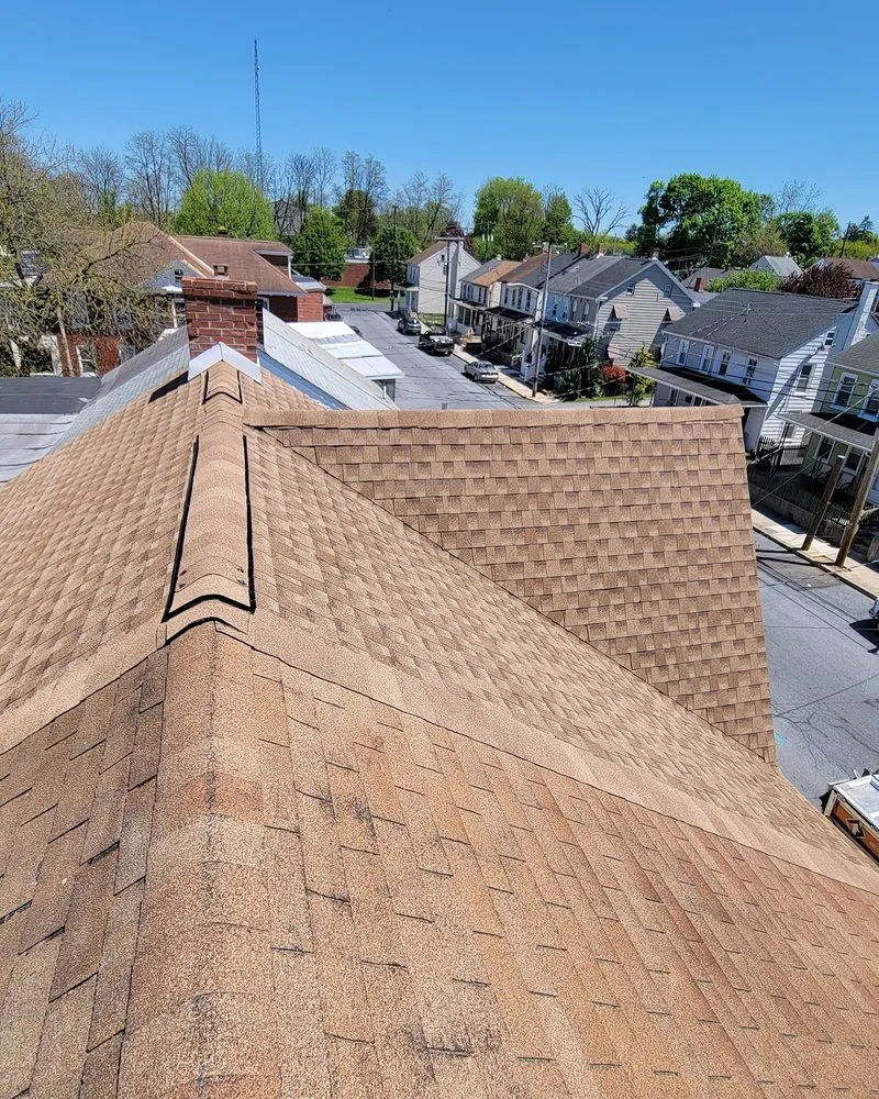 Slide of TopFlight Roofing