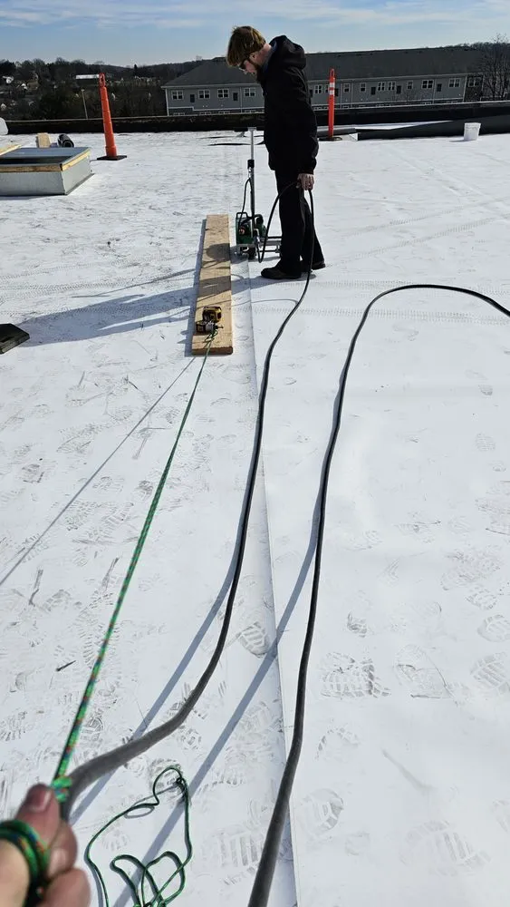 Slide of TopFlight Roofing