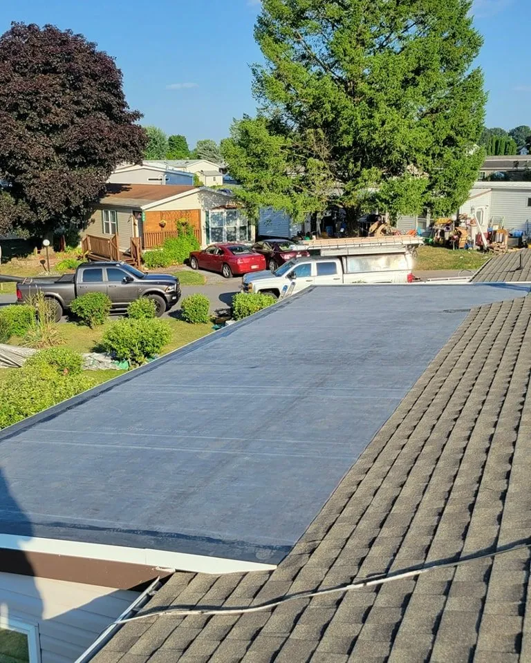 Slide of TopFlight Roofing