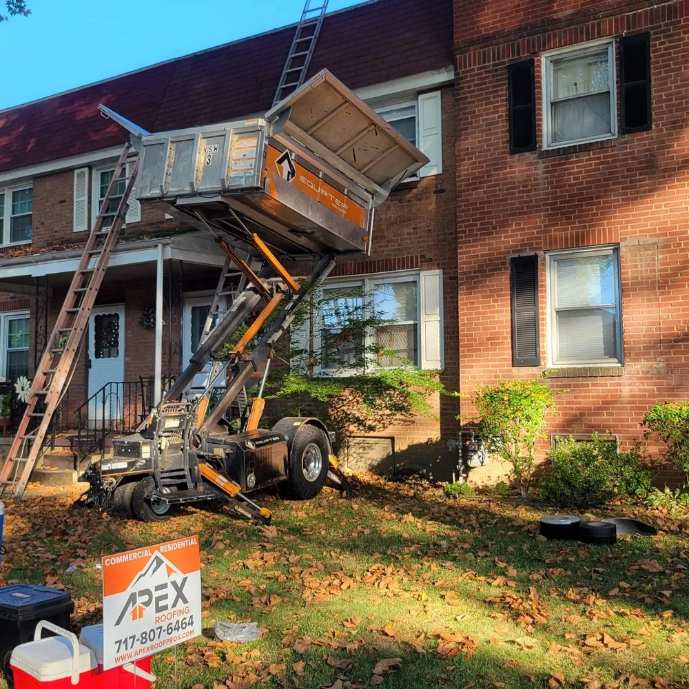 Slide of TopFlight Roofing