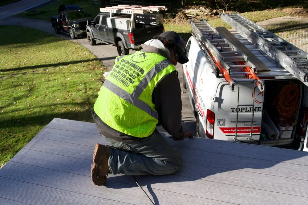 Slide of Topline Roofing