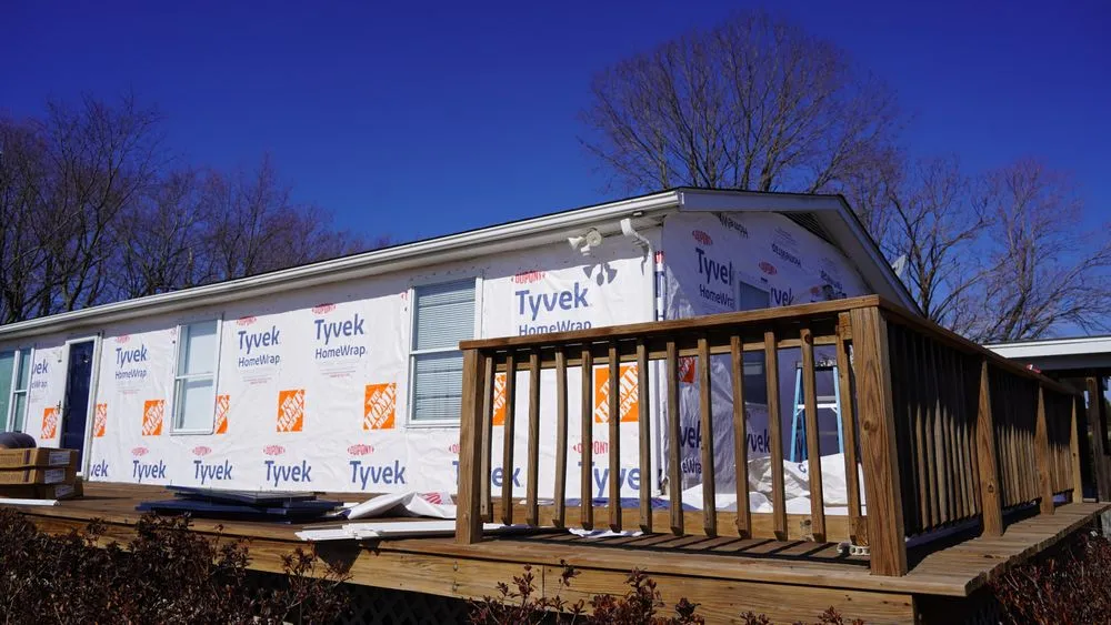 Slide of Topline Roofing