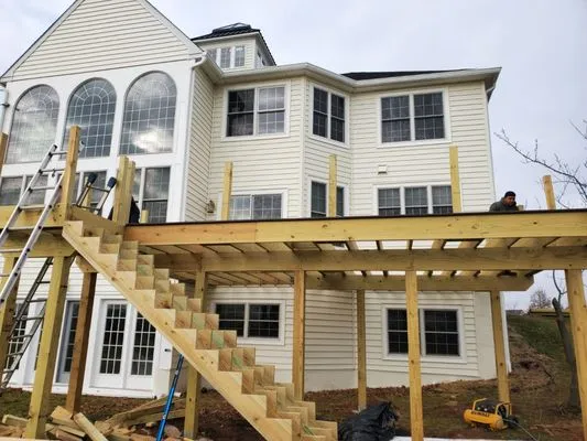 Toplines Siding And Roofing Logo