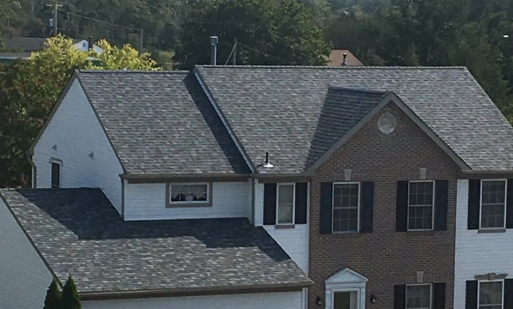 Slide of Topmac Roofing