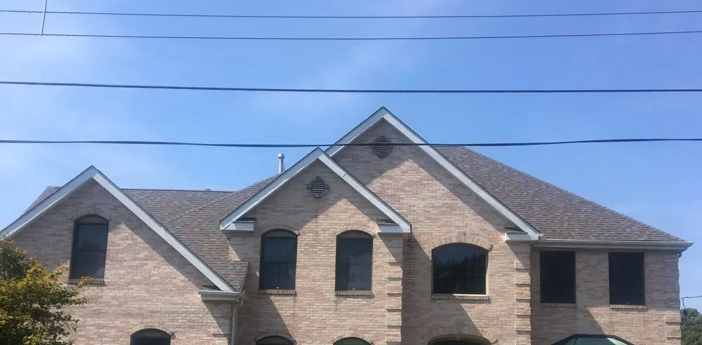 Slide of Topmac Roofing