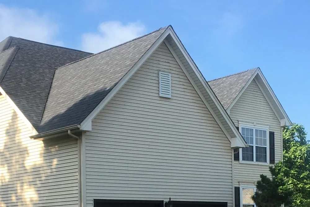 Slide of Topmac Roofing