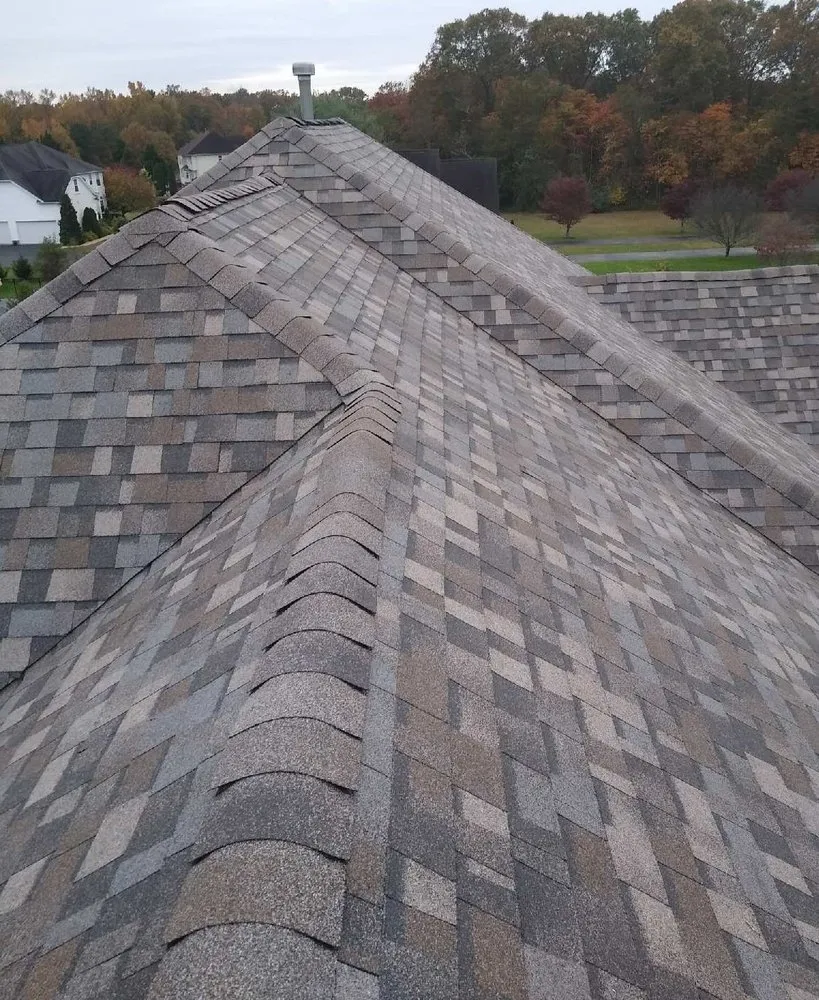 Slide of Topmac Roofing