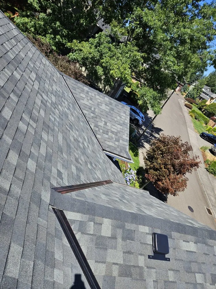 Slide of Topman Roofing Specialists