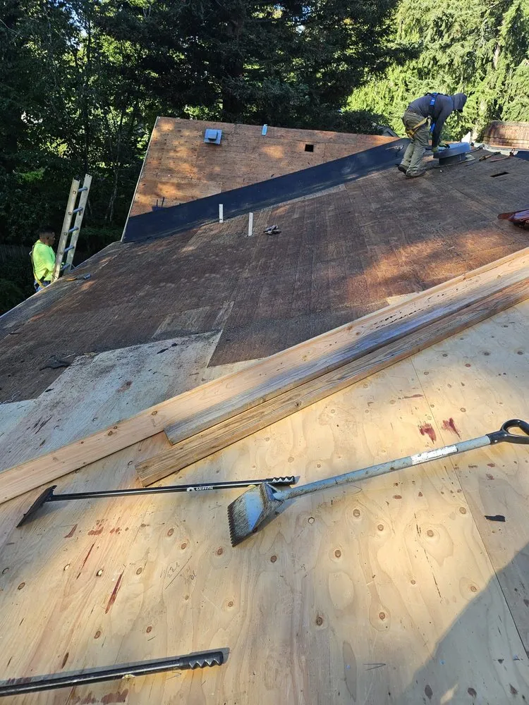 Slide of Topman Roofing Specialists