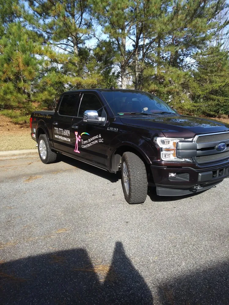 Slide of Topps Roofing & Construction