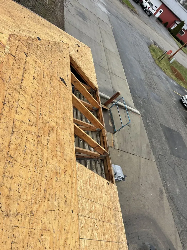 Slide of Topps Roofing & Construction