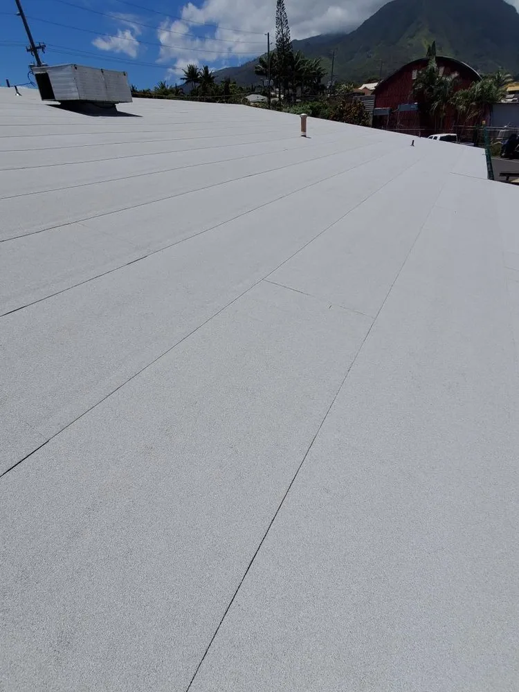 Slide of Top's Roofing Co