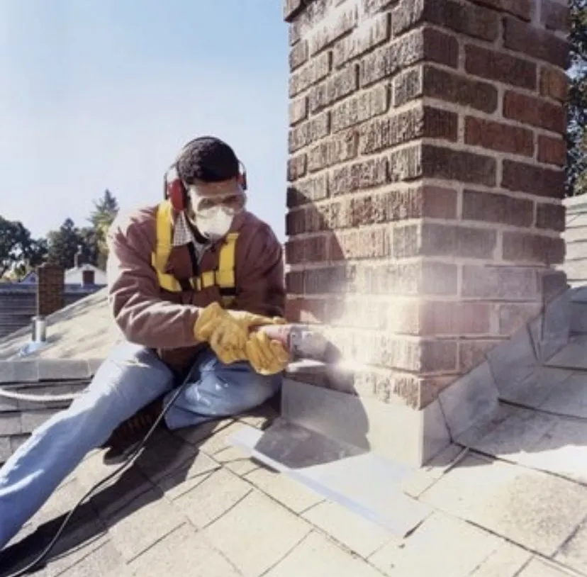 Emergency roof leak repair in Dix Hills, NJ by Topstone paving and masonry