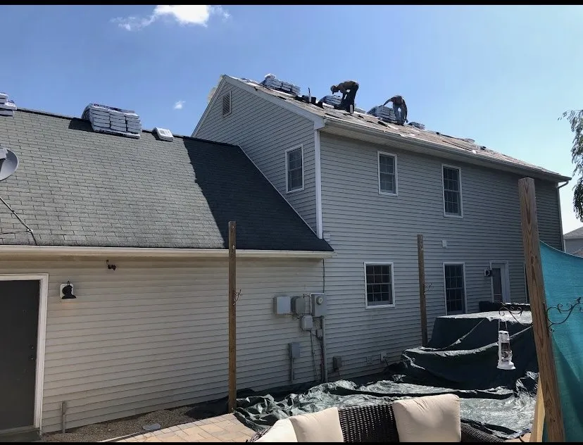 Expert roof leak repair after storm damage across Dix Hills, NJ - Topstone paving and masonry