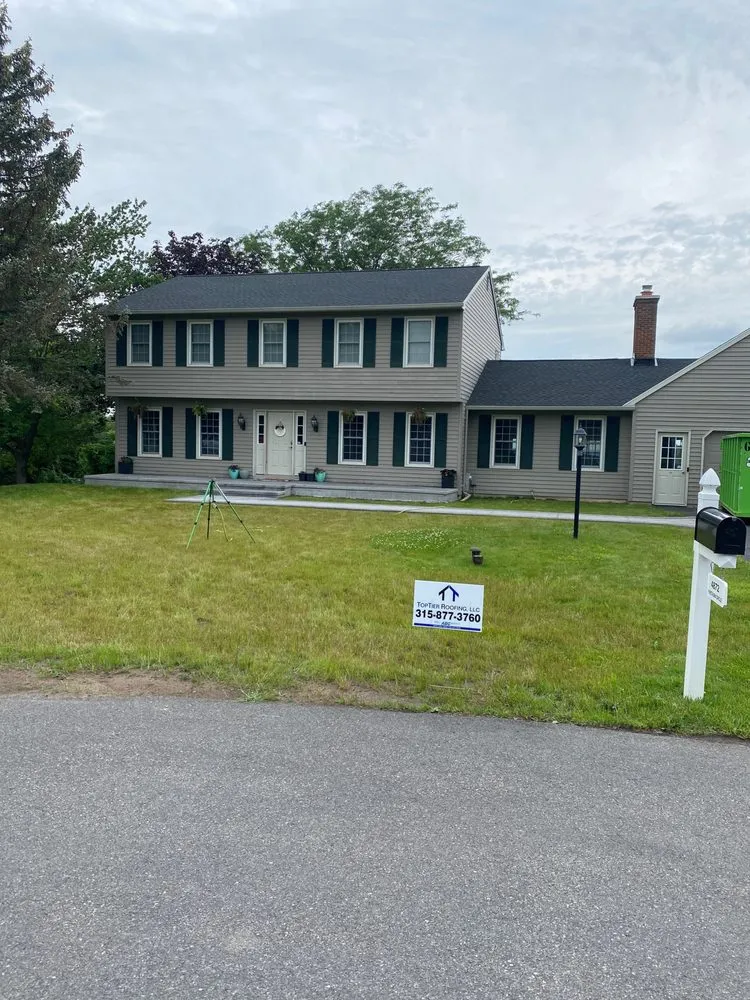 Slide of TopTier Roofing