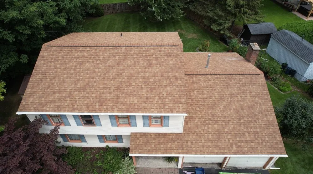 Slide of TopTier Roofing