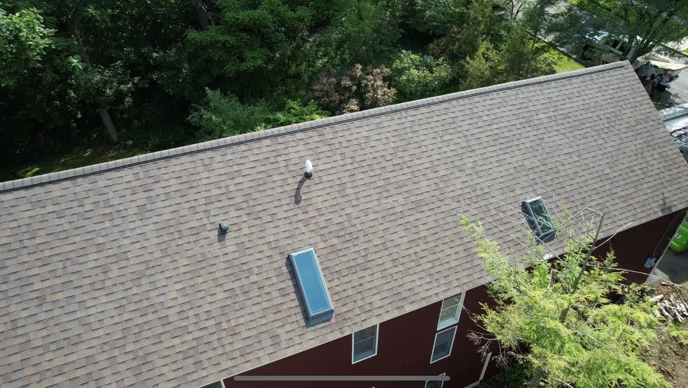 Slide of TopTier Roofing