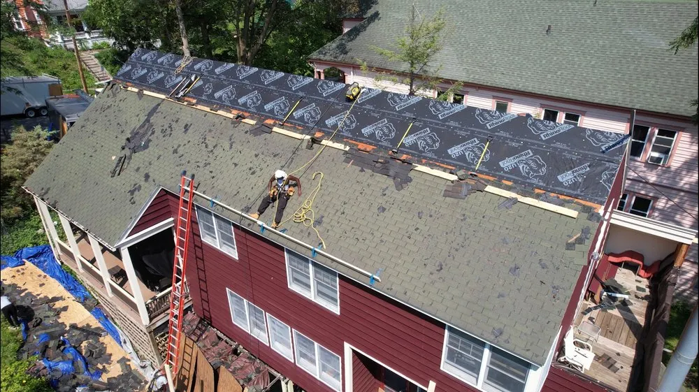 Slide of TopTier Roofing