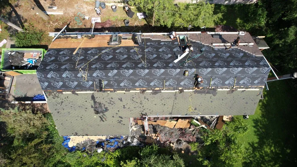 Slide of TopTier Roofing