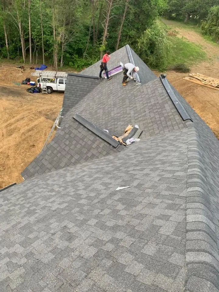 Slide of Torre's Roofing