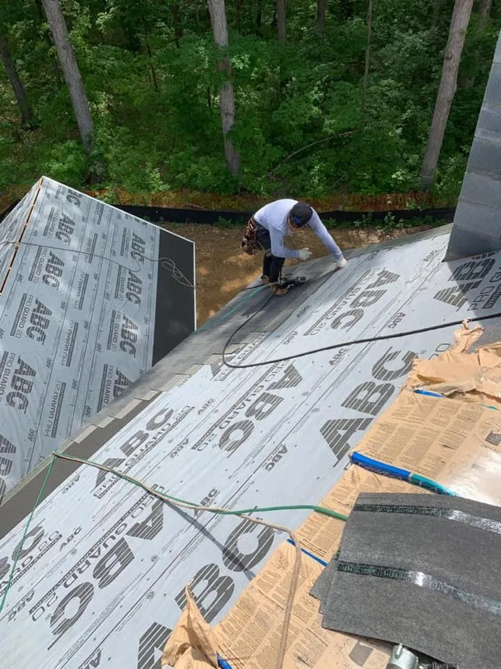 Slide of Torre's Roofing