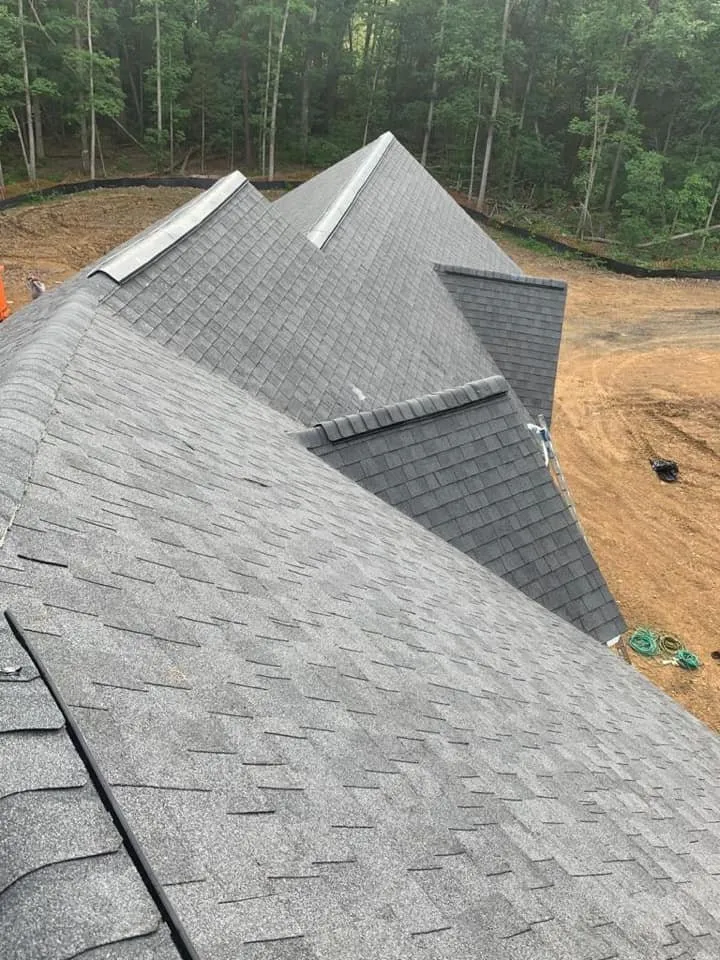 Slide of Torre's Roofing