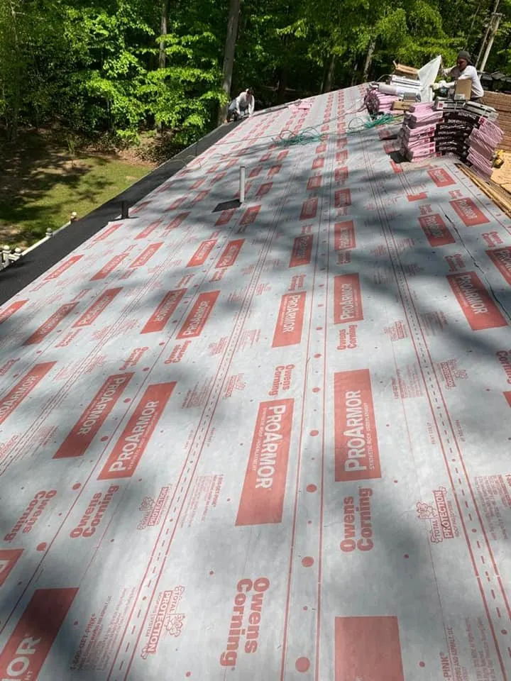 Slide of Torre's Roofing