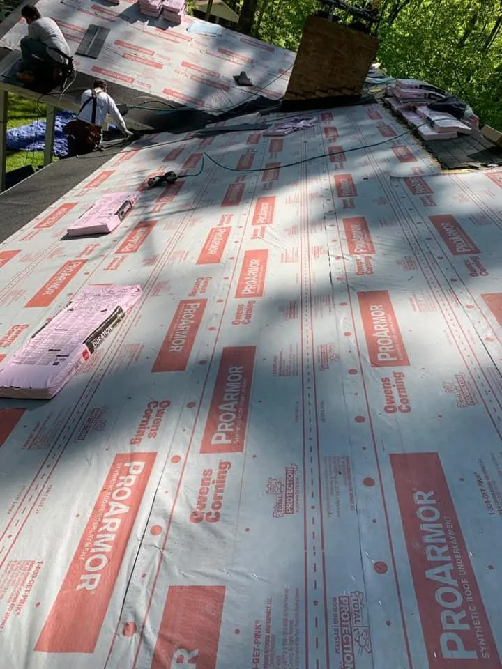 Slide of Torre's Roofing