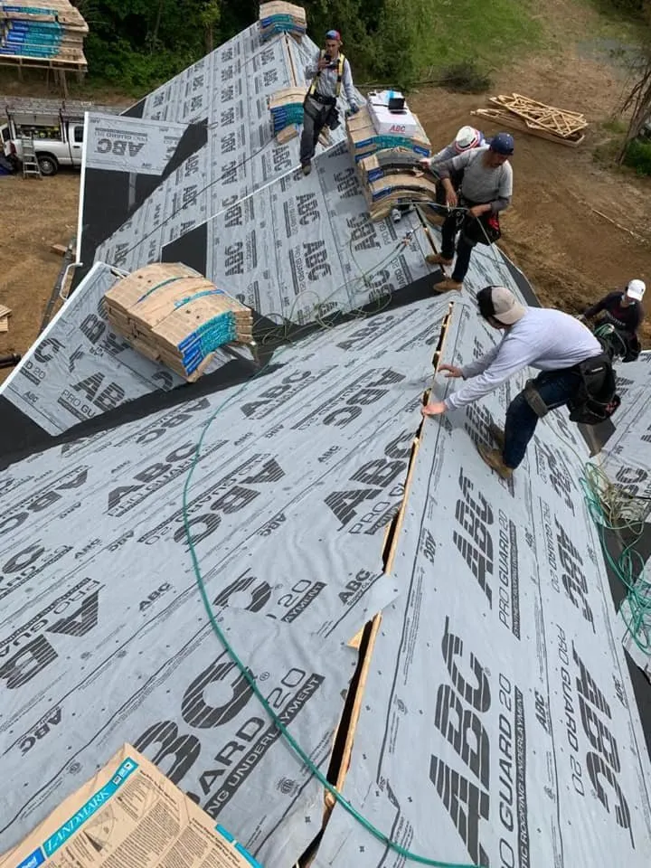 Slide of Torre's Roofing