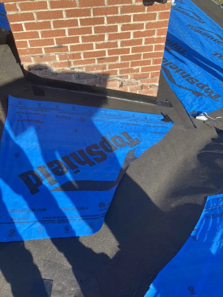 Slide of Torres Roofing