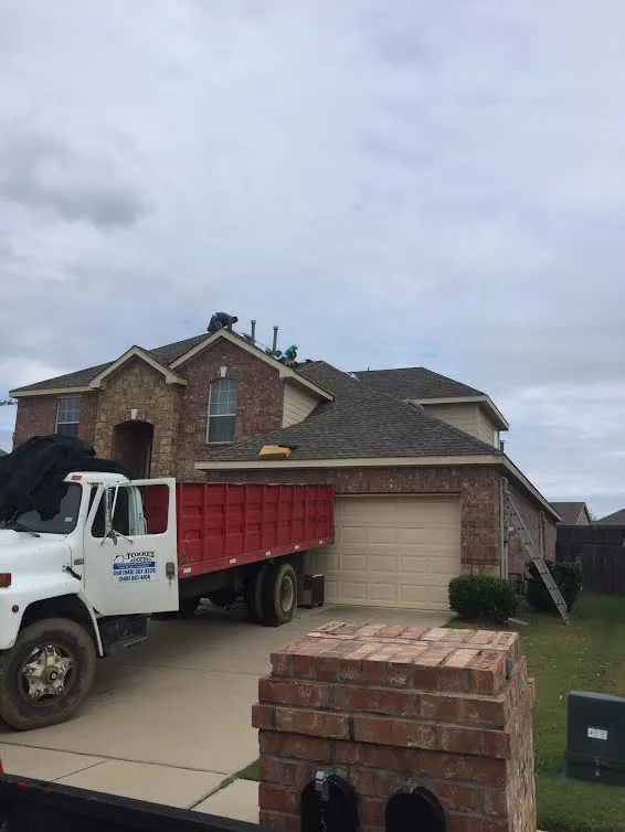 Slide of Torres Roofing