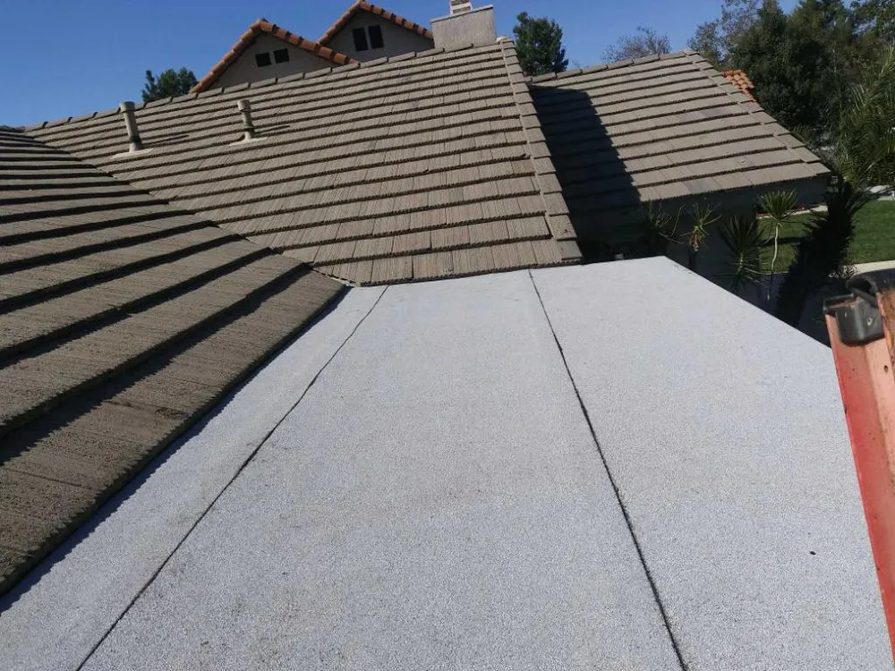 Slide of Torres Roofing