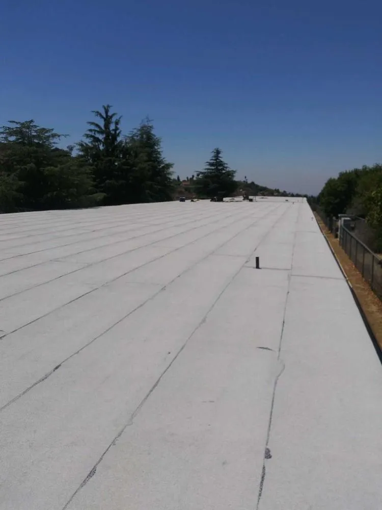 Slide of Torres Roofing