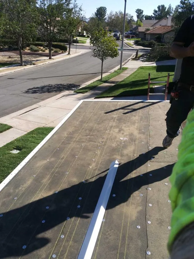 Slide of Torres Roofing