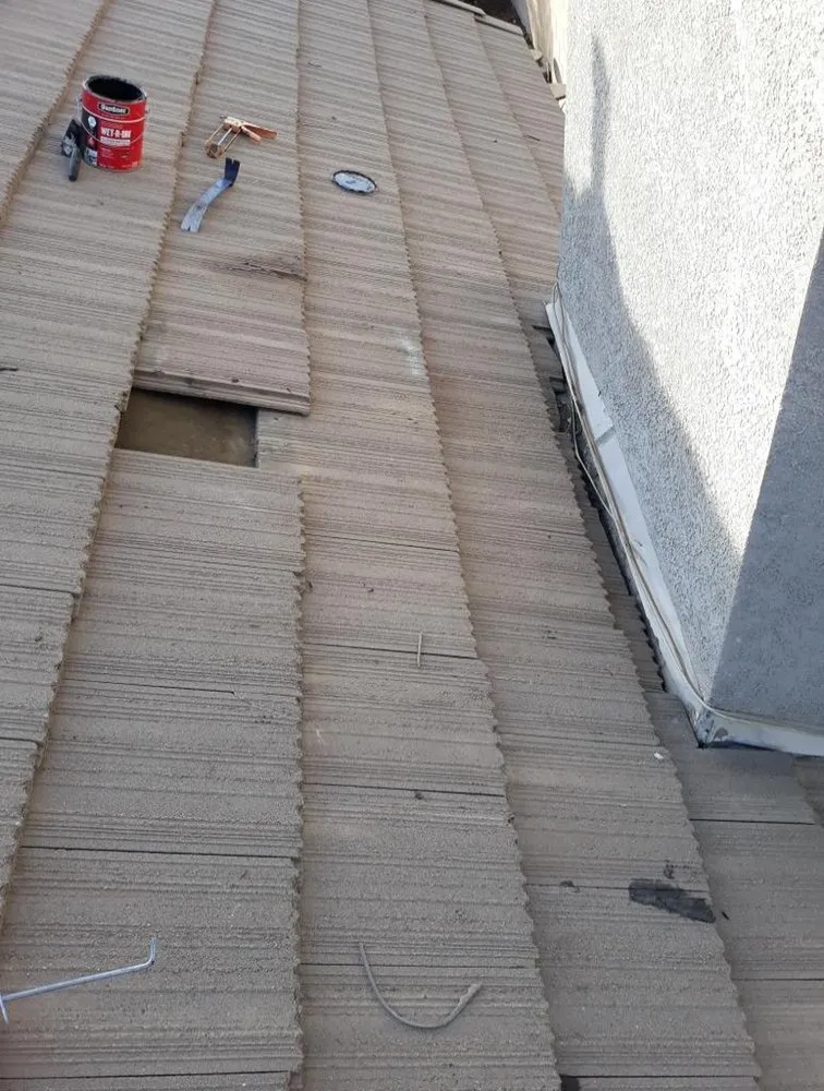 Slide of Torres Roofing