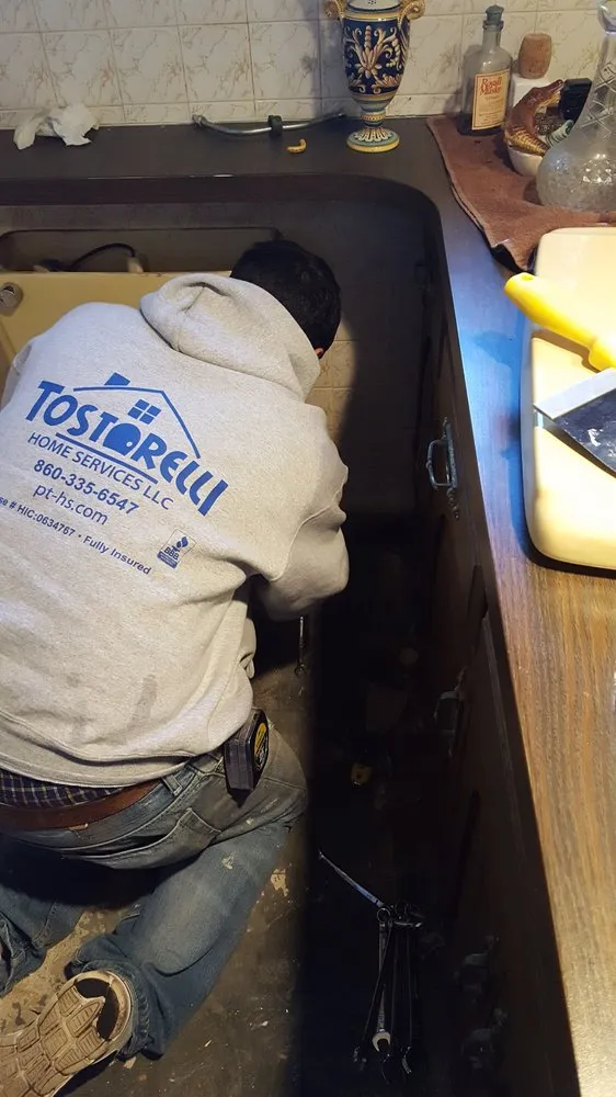 Slide of Tostarelli Home Services