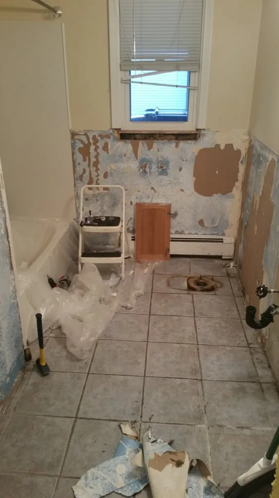 Slide of Tostarelli Home Services