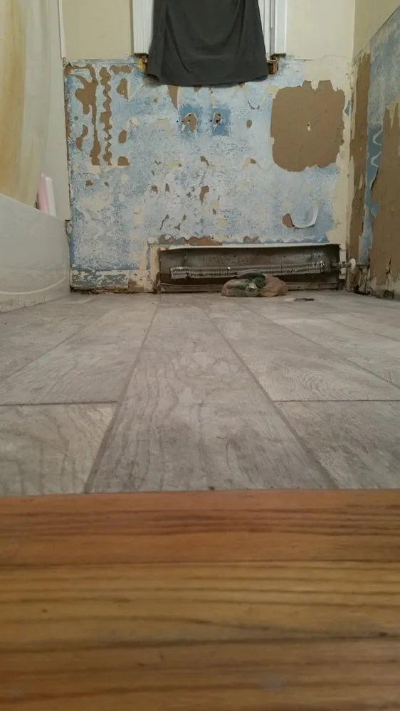 Slide of Tostarelli Home Services