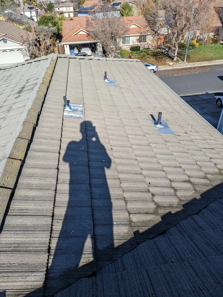 Slide of Total Package Roofing