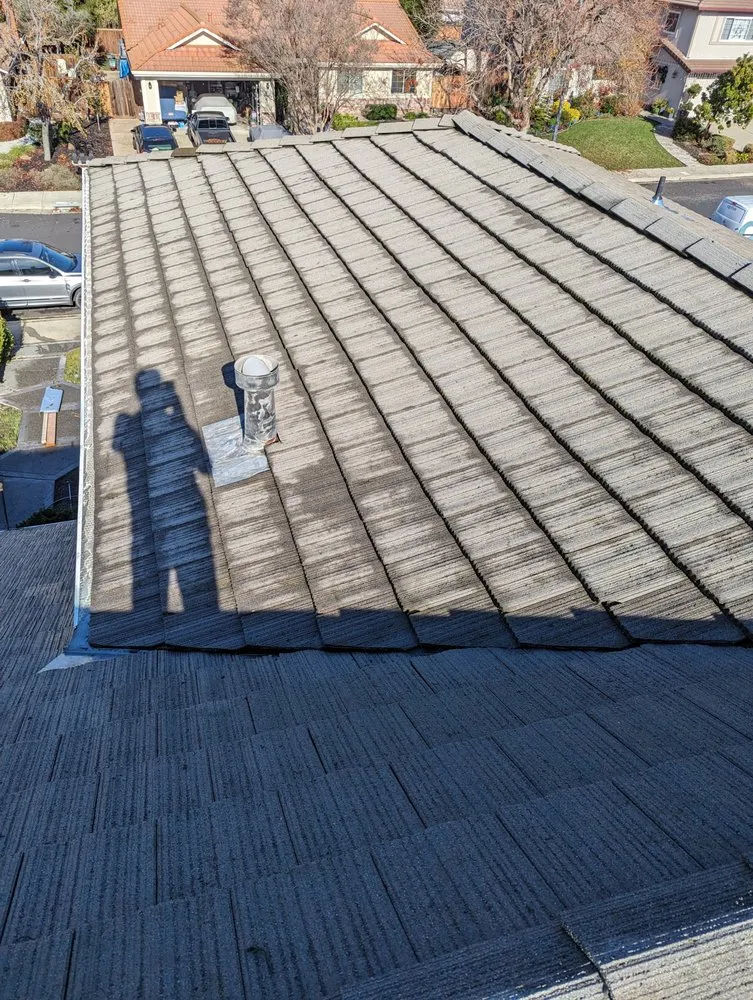 Slide of Total Package Roofing