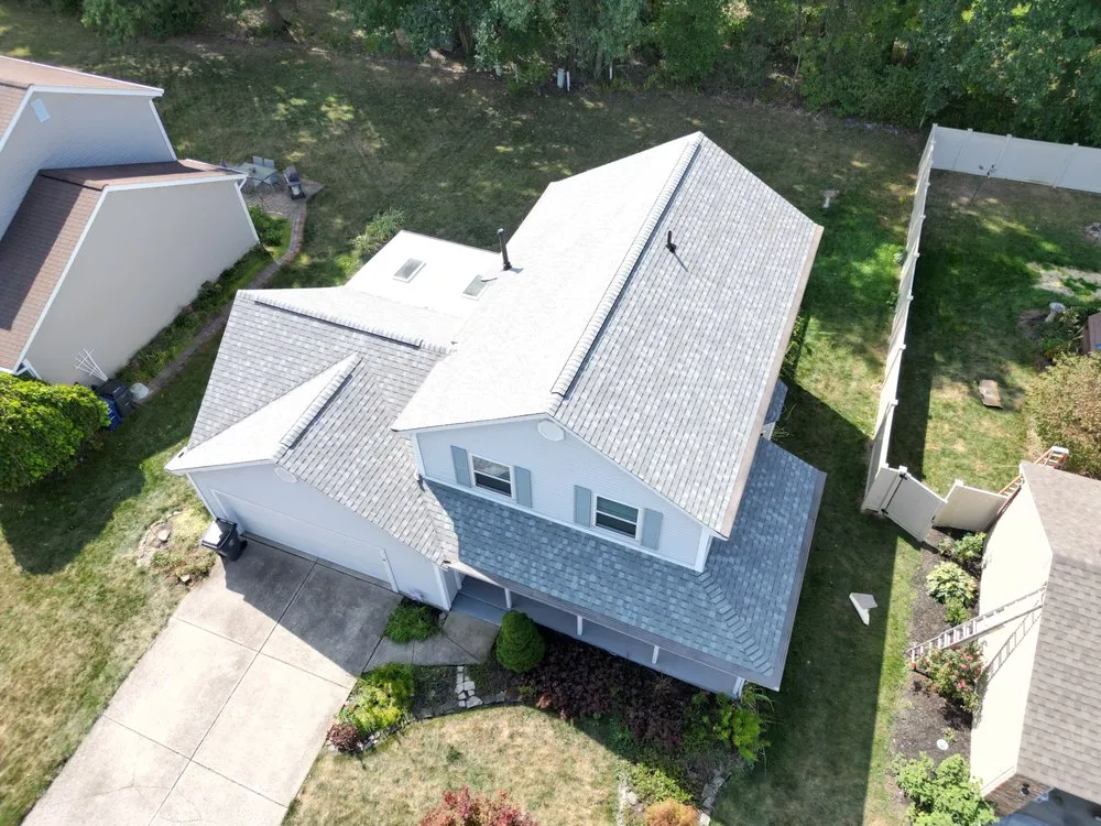 Slide of Total Quality Roofing